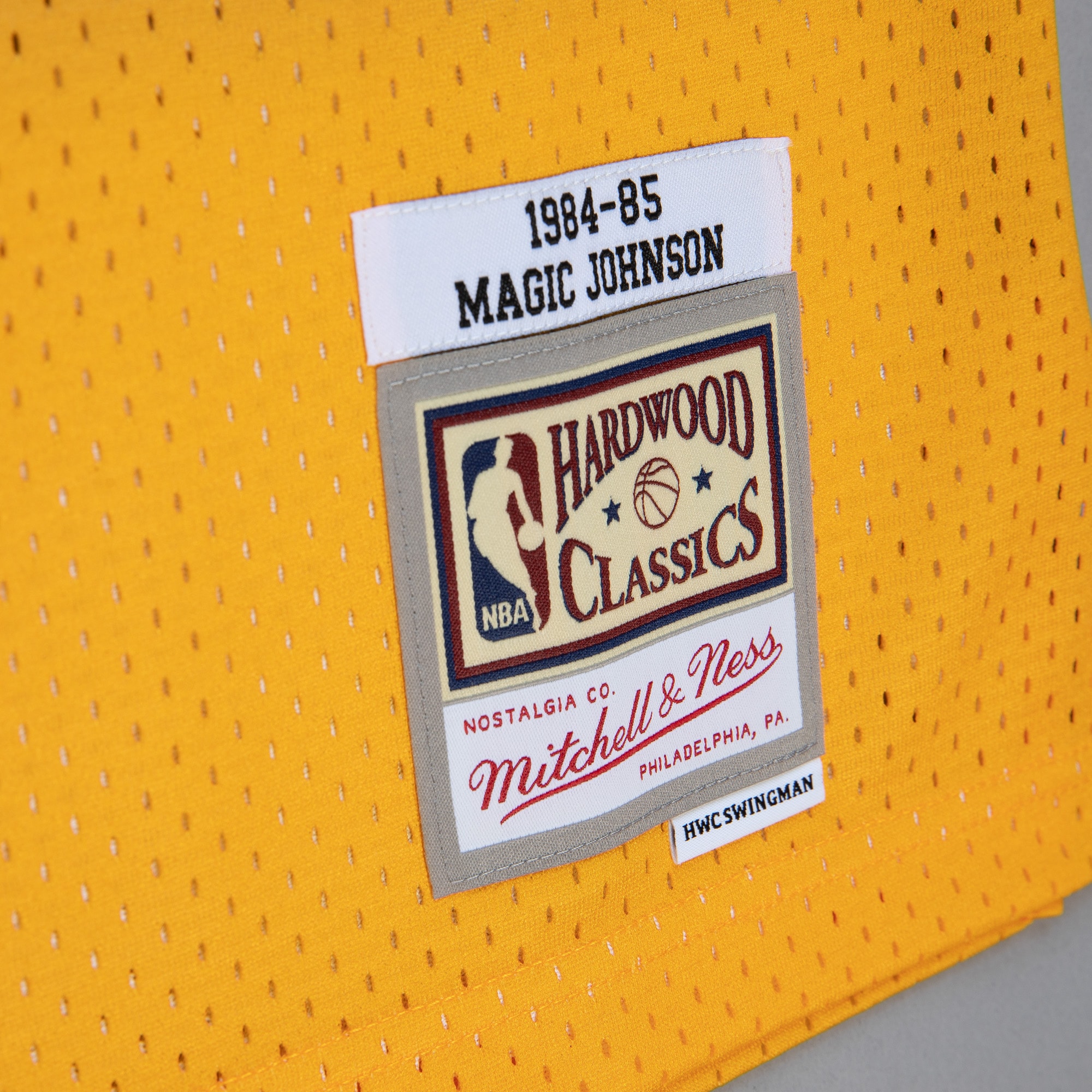 Men's Los Angeles Lakers Magic Johnson Gold/Purple 1984/85 Hardwood Classics Fadeaway Swingman Player Jersey