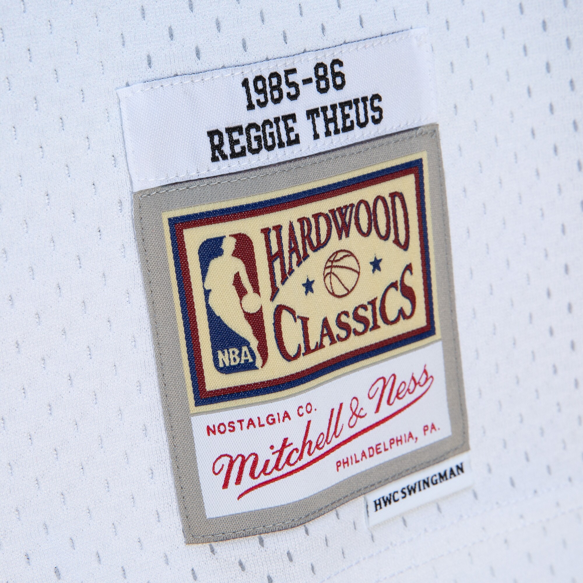 Men's Sacramento Kings Reggie Theus White/Light Blue 1985/86 Hardwood Classics Fadeaway Swingman Player Jersey