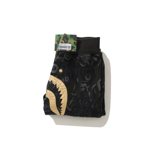 BAPE x NBHD joint style shark head black and gold trousers