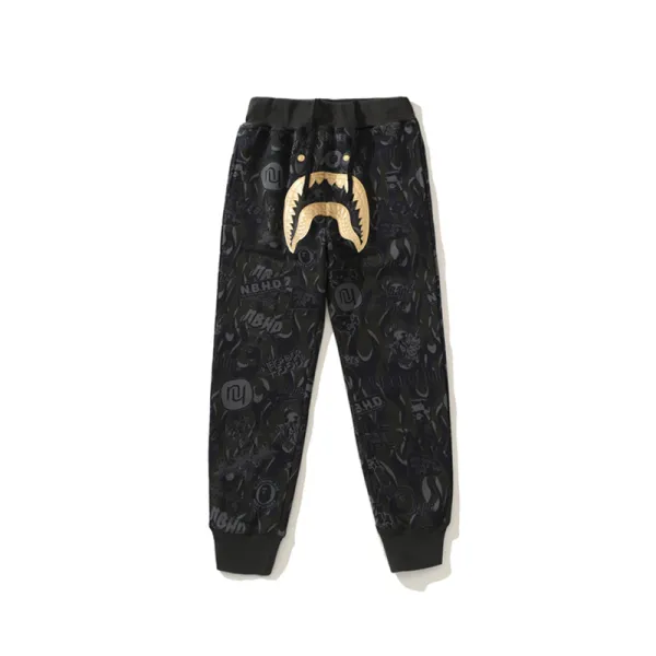 BAPE x NBHD joint style shark head black and gold trousers
