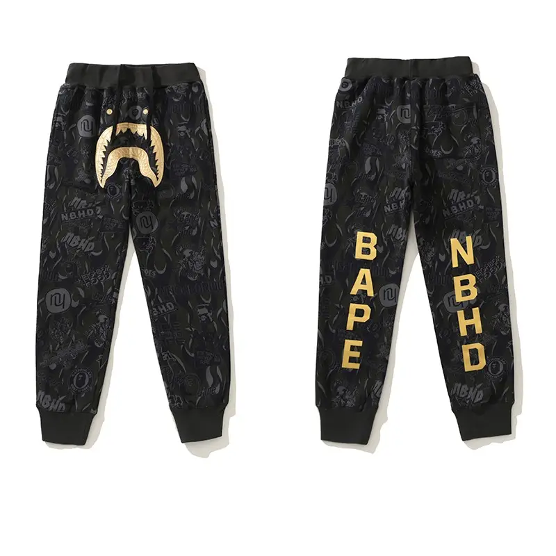 BAPE x NBHD joint style shark head black and gold trousers