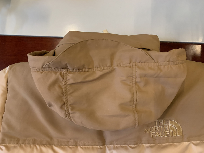 the n0*h F**e kha ki down jacket