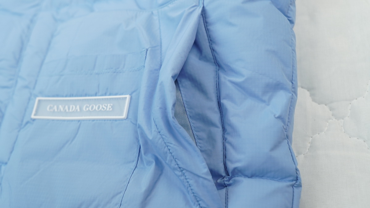 Can*a Go*e outdoor sports down vest glacier blue ba7bn