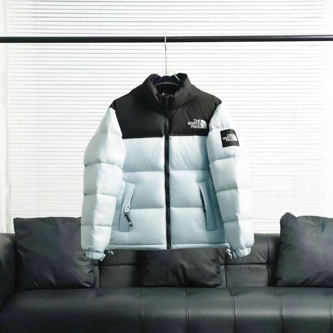 the n0*h F**e splicing white and blue down jacket