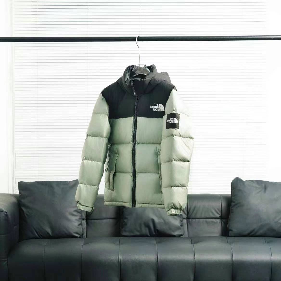 the n0*h F**e splicing white and green down jacket