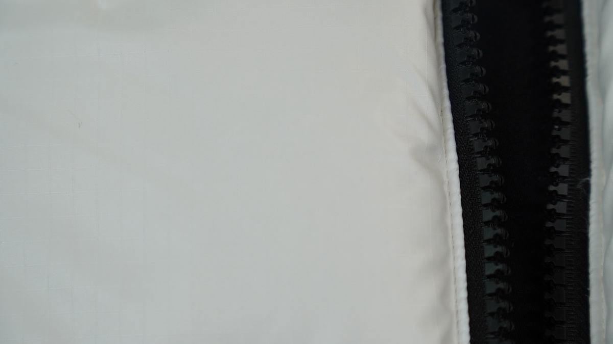 the n0*h F**e splicing white and white down jacket