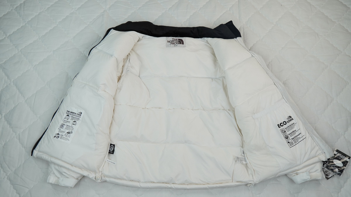 the n0*h F**e splicing white and white down jacket