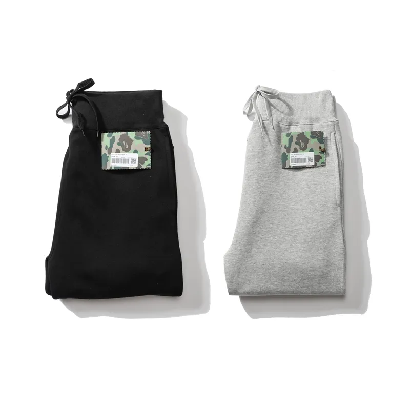 bape letter print solid color sports trousers