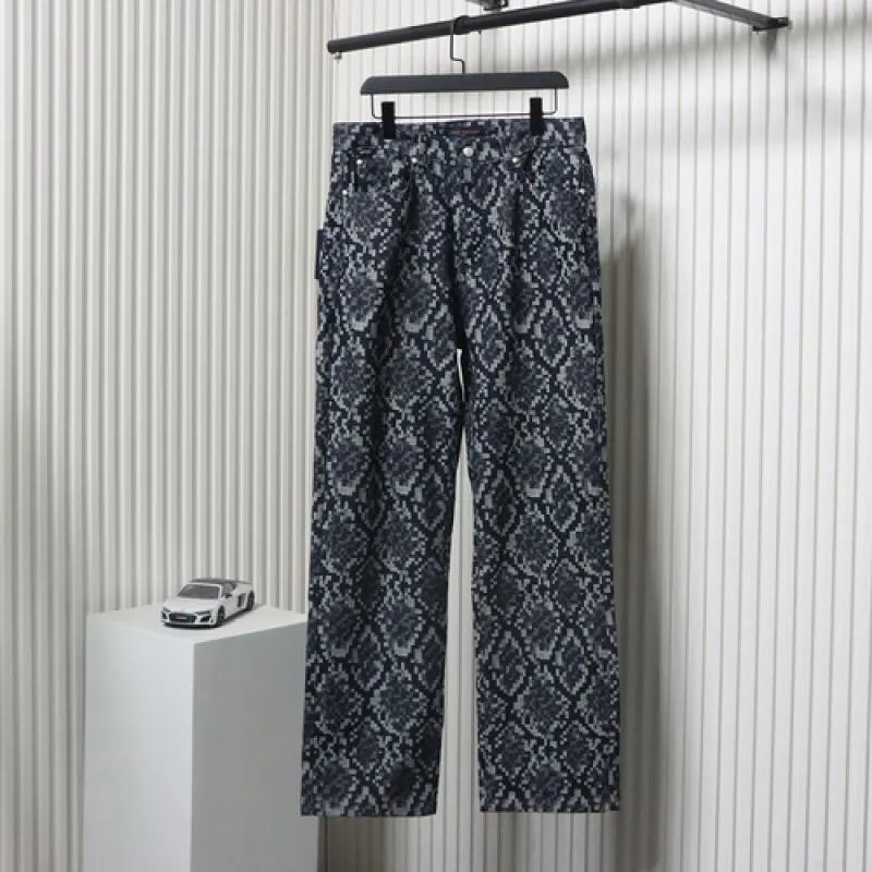 Louis Vuitton asymmetric snake print jeans