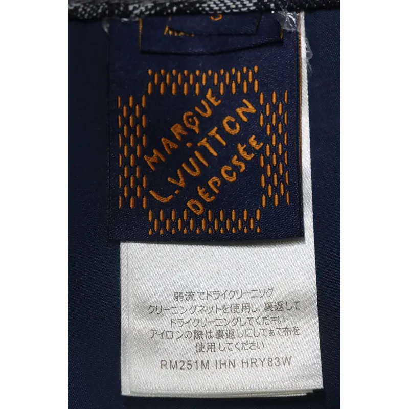 Louis Vuitton asymmetric snake print jeans