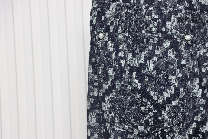 Louis Vuitton asymmetric snake print jeans