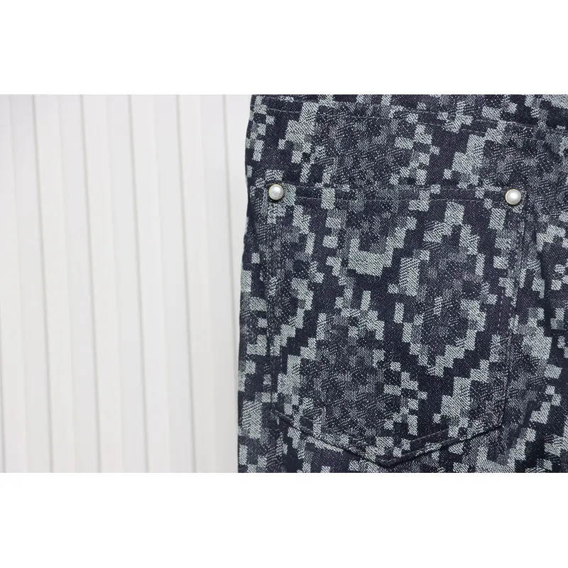 Louis Vuitton asymmetric snake print jeans