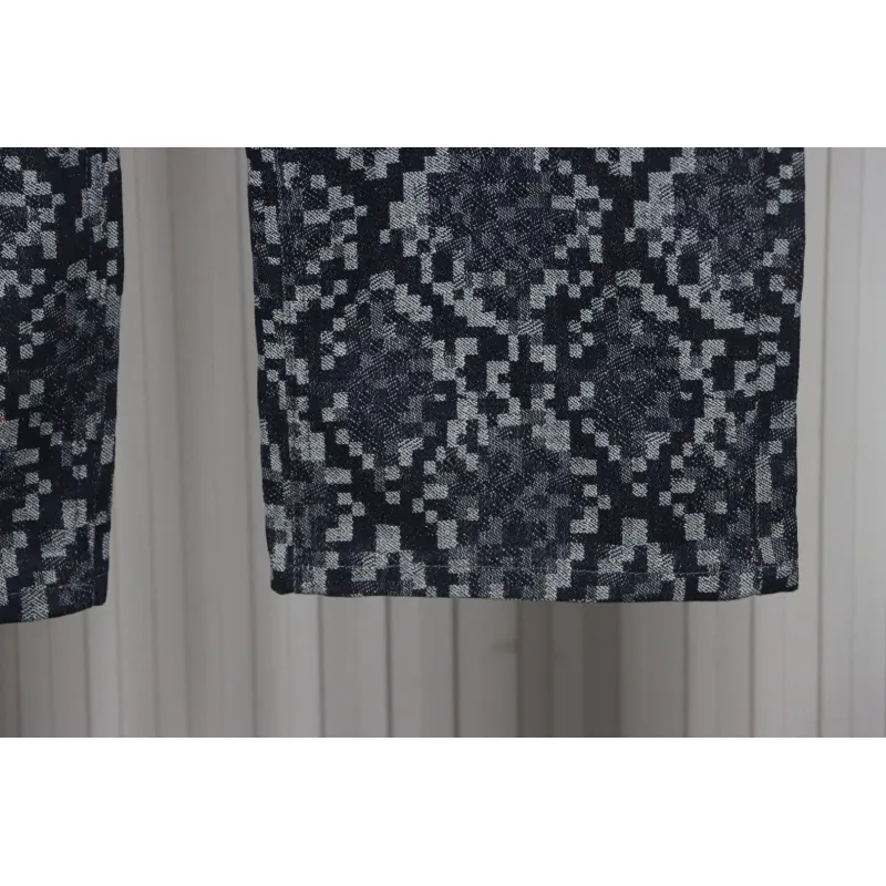 Louis Vuitton asymmetric snake print jeans