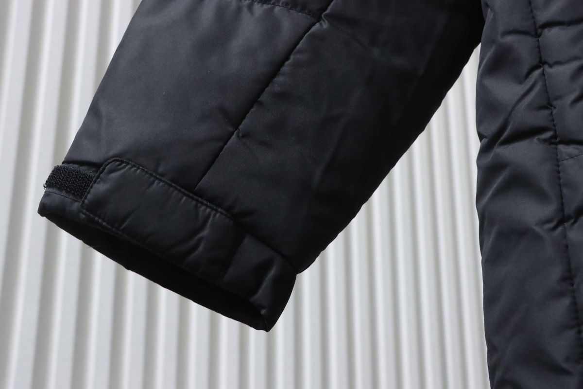 The North Face long hooded down jacket in black