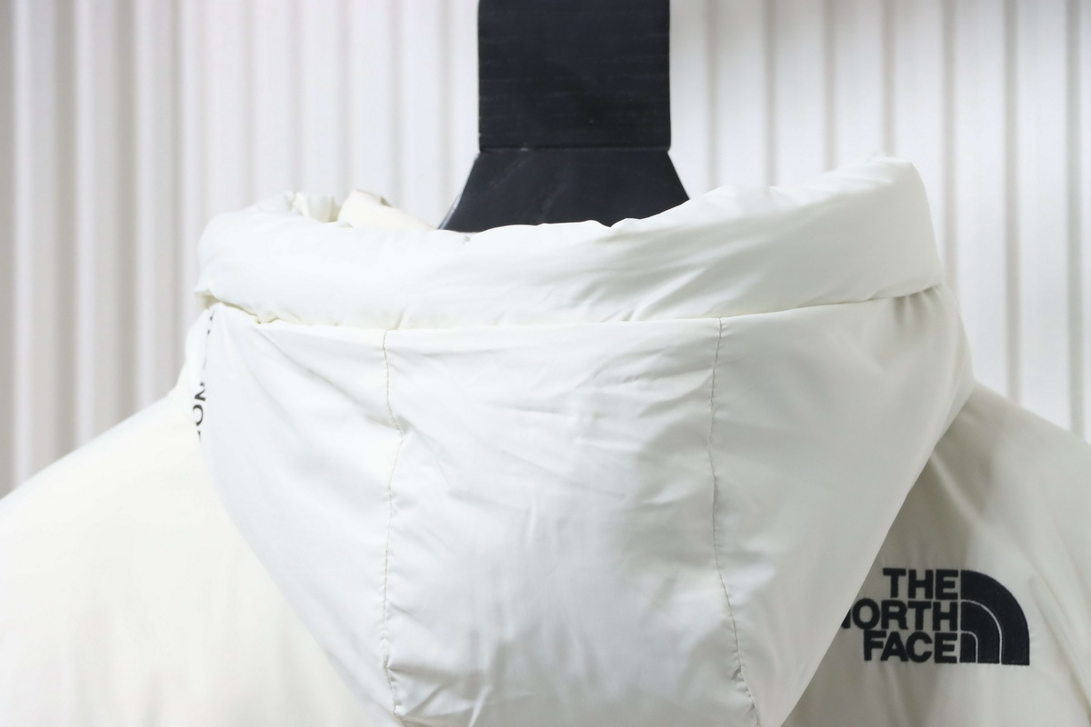 The North Face long hooded down jacket in white