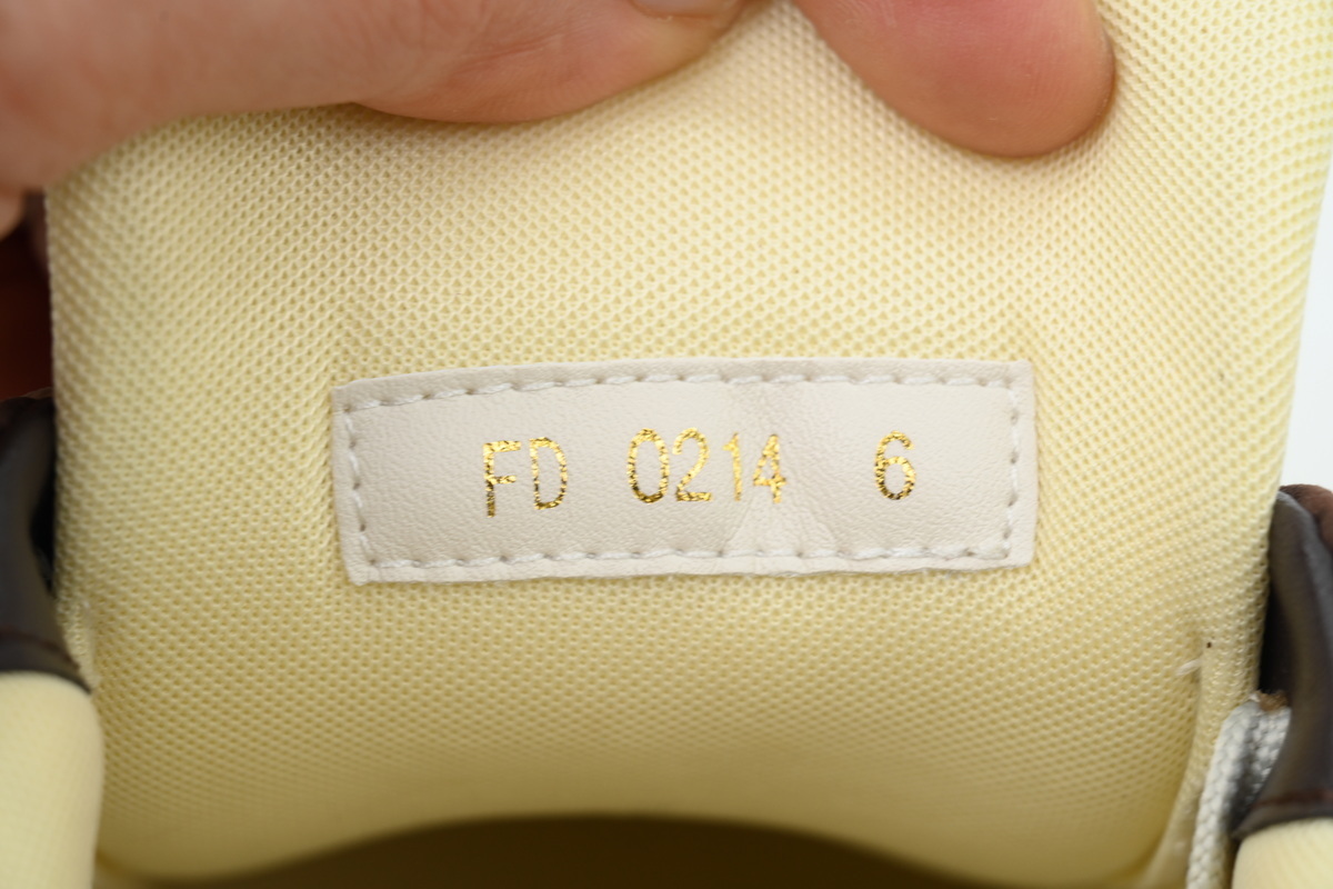 LOUIS VUITTON Brown embossed