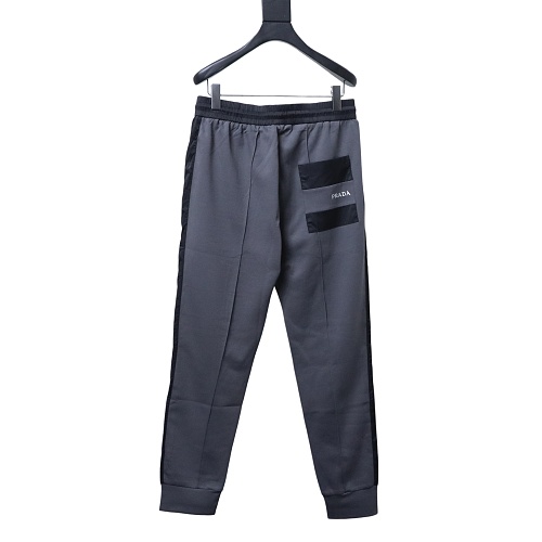Prada Trousers With Red Side Stripes