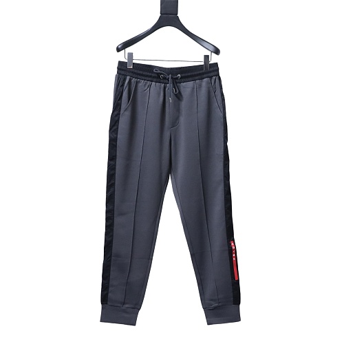 Prada Trousers With Red Side Stripes