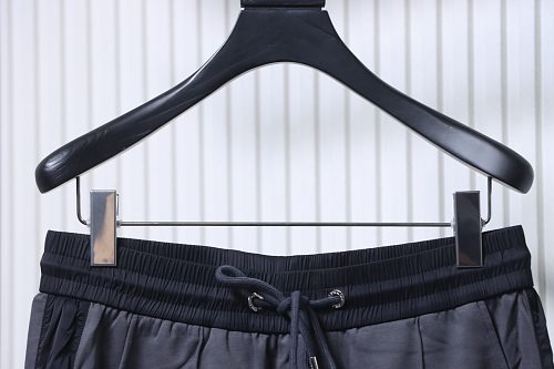 Prada Trousers With Red Side Stripes