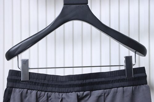 Prada Trousers With Red Side Stripes