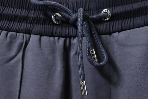 Prada Trousers With Red Side Stripes