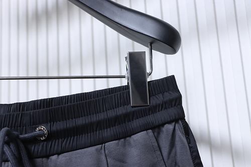 Prada Trousers With Red Side Stripes