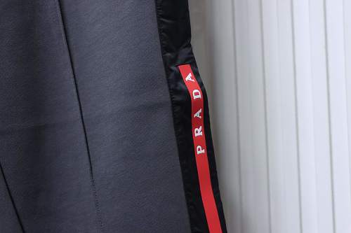 Prada Trousers With Red Side Stripes