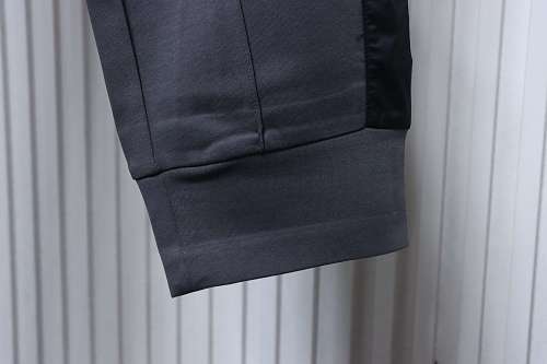 Prada Trousers With Red Side Stripes