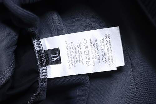 Prada Trousers With Red Side Stripes