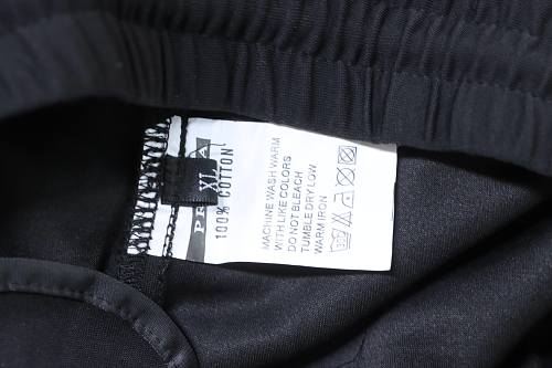 Prada Trousers With Side Pockets And Buckle Closures