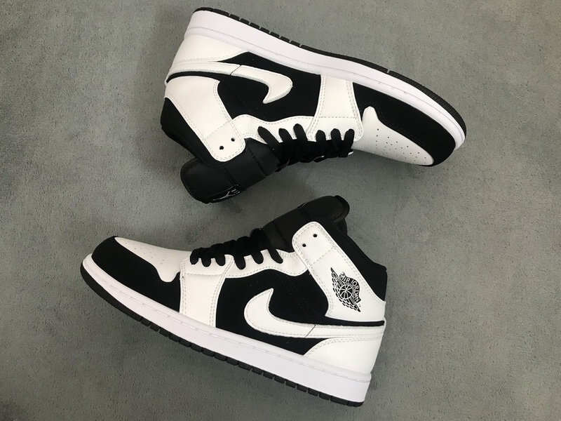 black and white jordan mids