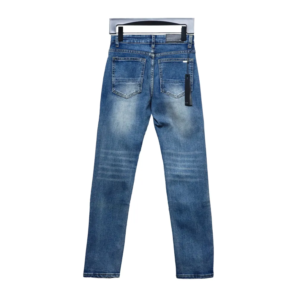AMIRI MX1 pink diamond washed ripped denim trousers
