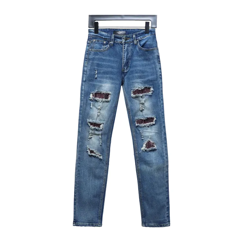 AMIRI MX1 pink diamond washed ripped denim trousers