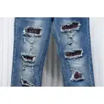 AMIRI MX1 pink diamond washed ripped denim trousers
