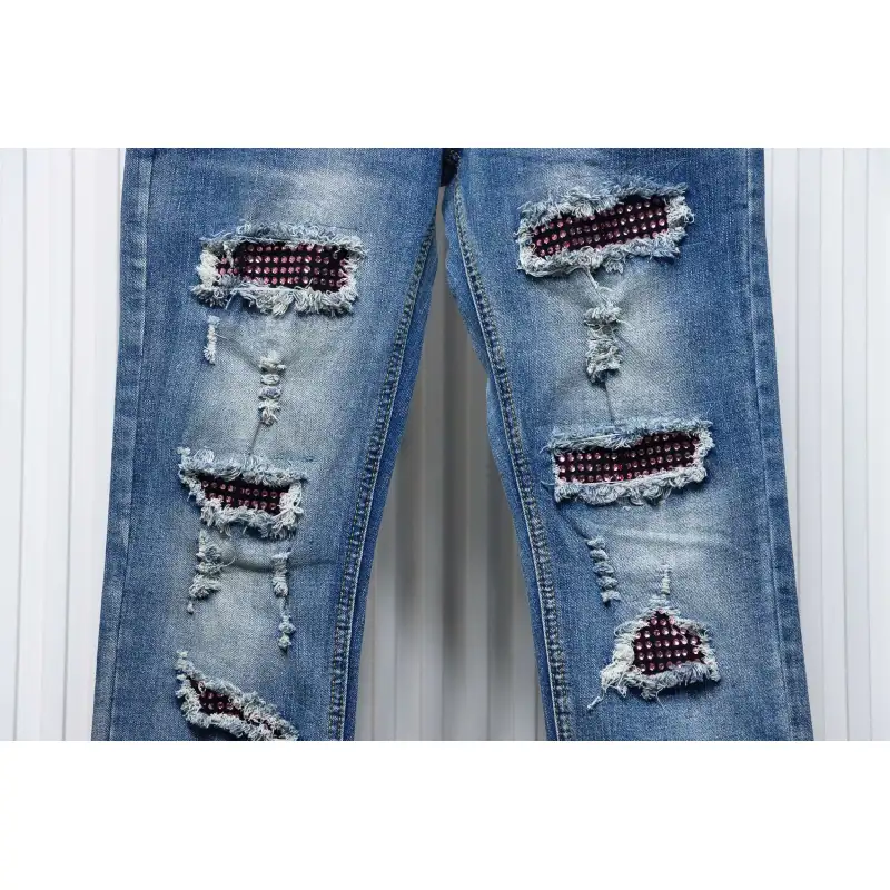 AMIRI MX1 pink diamond washed ripped denim trousers