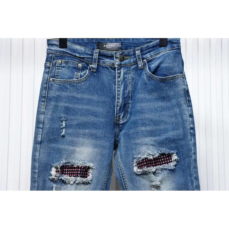 AMIRI MX1 pink diamond washed ripped denim trousers