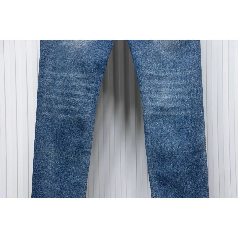 AMIRI MX1 pink diamond washed ripped denim trousers