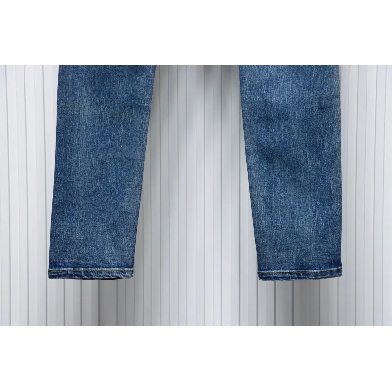 AMIRI MX1 pink diamond washed ripped denim trousers