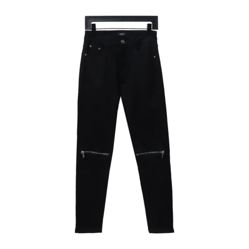 AMIRI MX1 zip-up washed stretch denim trousers