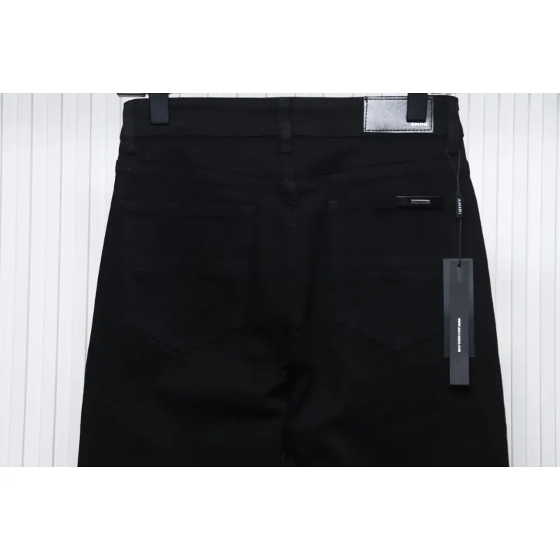 AMIRI MX1 zip-up washed stretch denim trousers