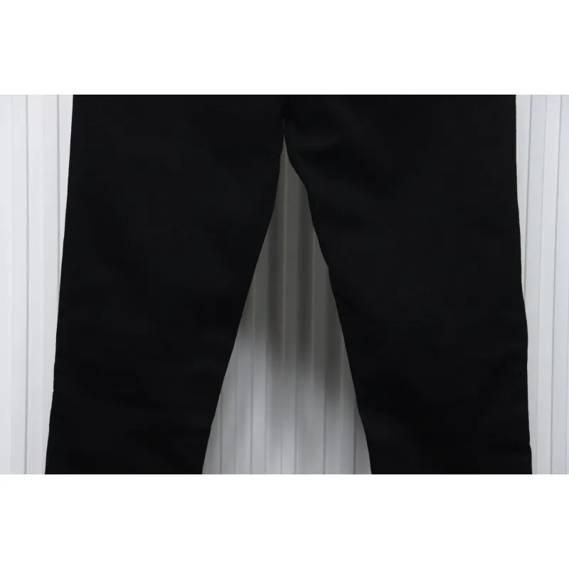 AMIRI MX1 zip-up washed stretch denim trousers