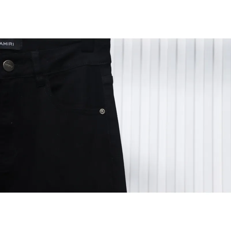 AMIRI MX1 zip-up washed stretch denim trousers