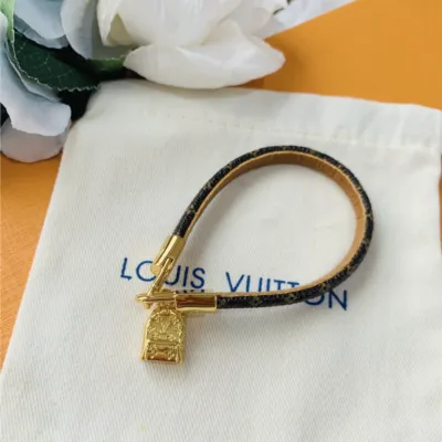 LV monogram small backpack with pendant and leather bracelet 02