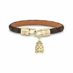 LV monogram small backpack with pendant and leather bracelet
