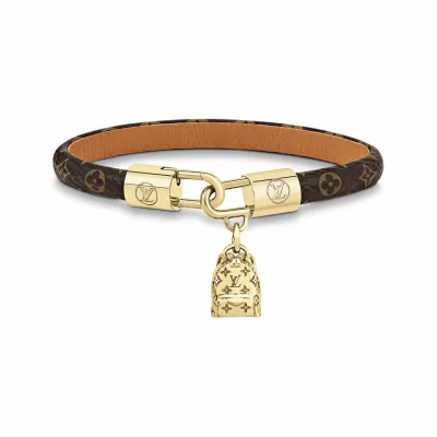 LV monogram small backpack with pendant and leather bracelet 01