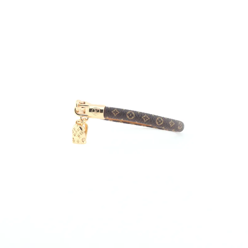 LV monogram small backpack with pendant and leather bracelet