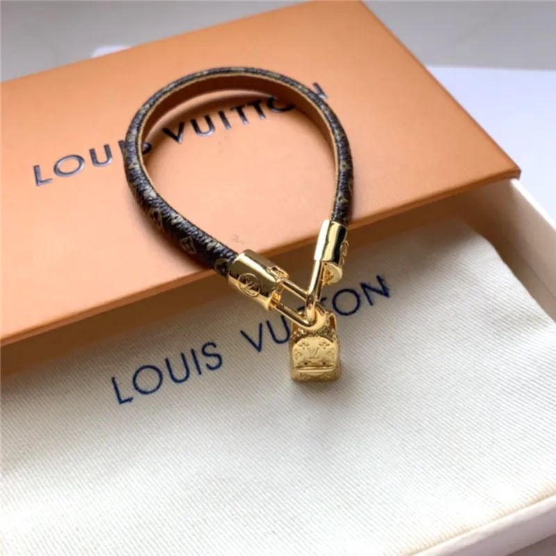 LV monogram small backpack with pendant and leather bracelet