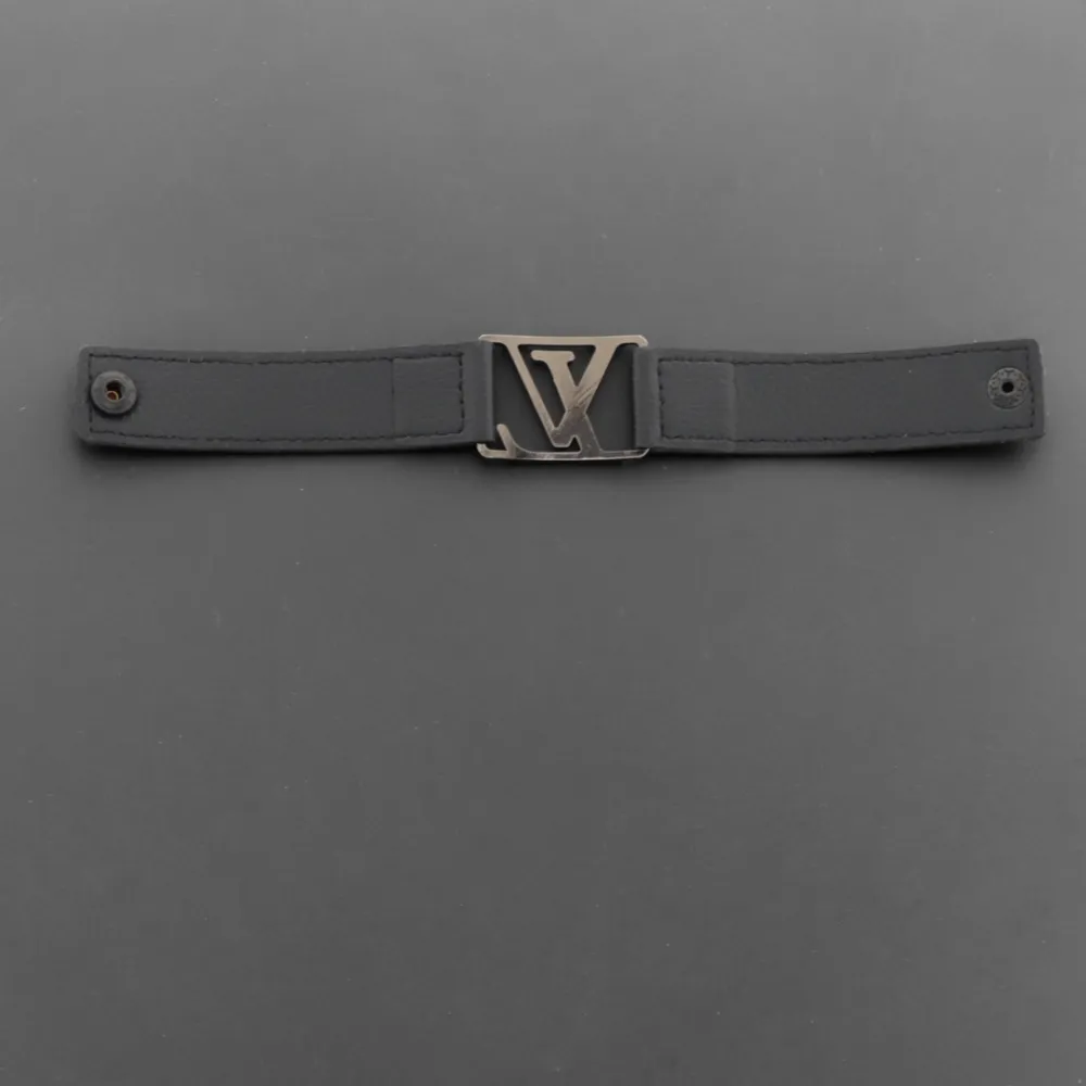 LV engraved metal leather bracelet