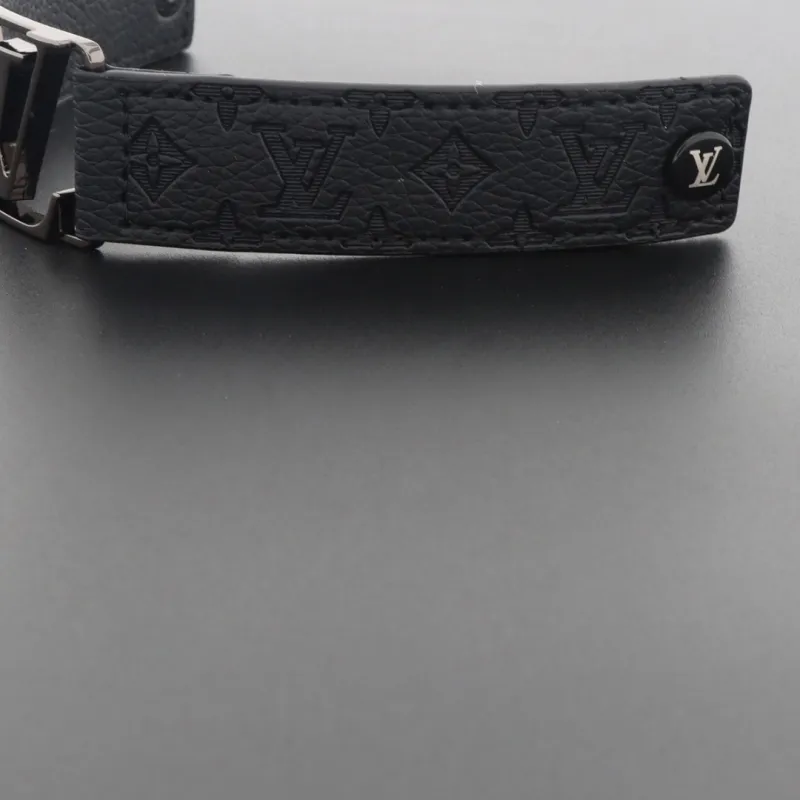 LV engraved metal leather bracelet