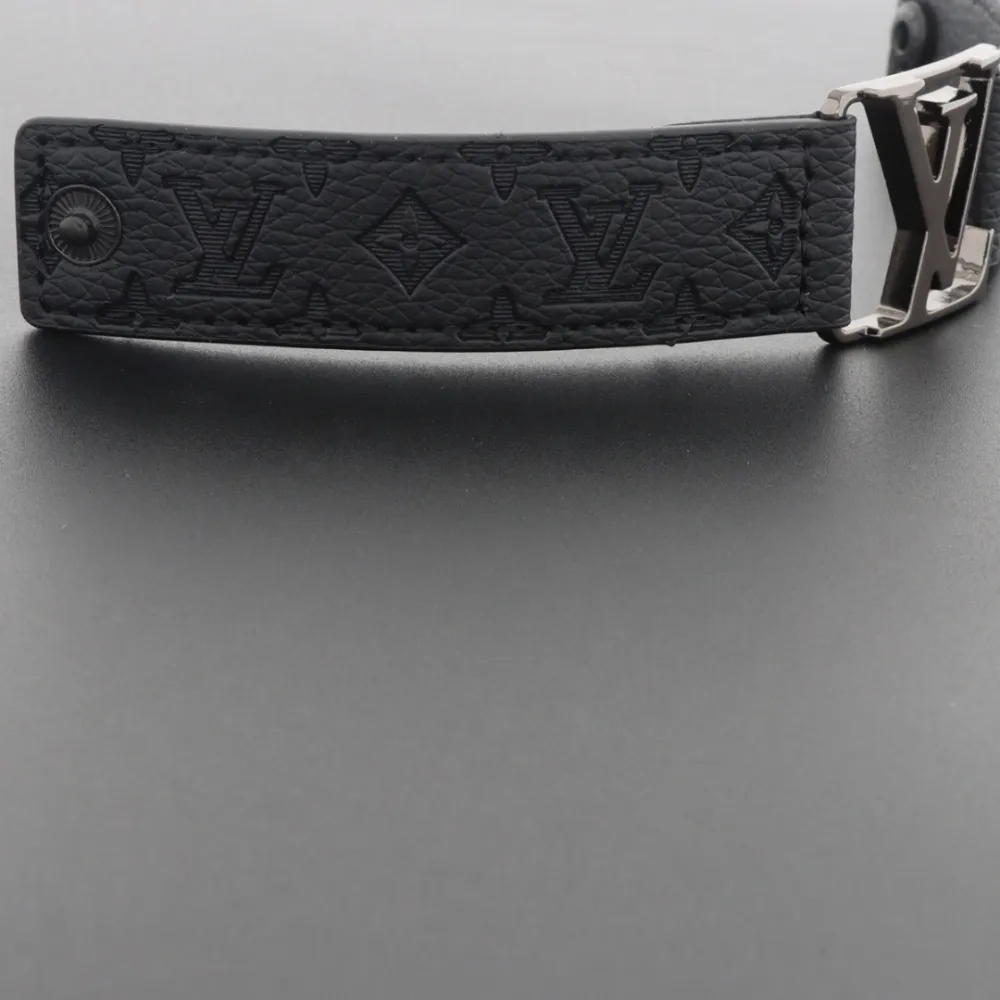 LV engraved metal leather bracelet